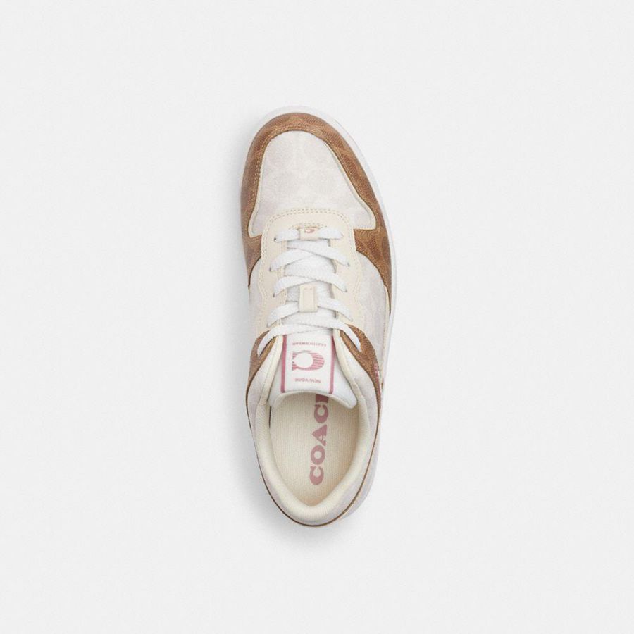 White Women COACH® C201 Low Top In Signature Canvas Sneakers | 07432SUAZ