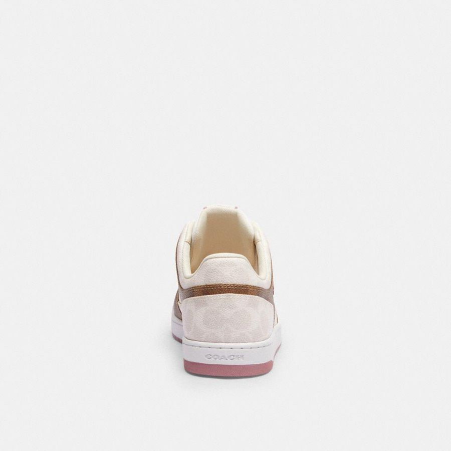 White Women COACH® C201 Low Top In Signature Canvas Sneakers | 07432SUAZ